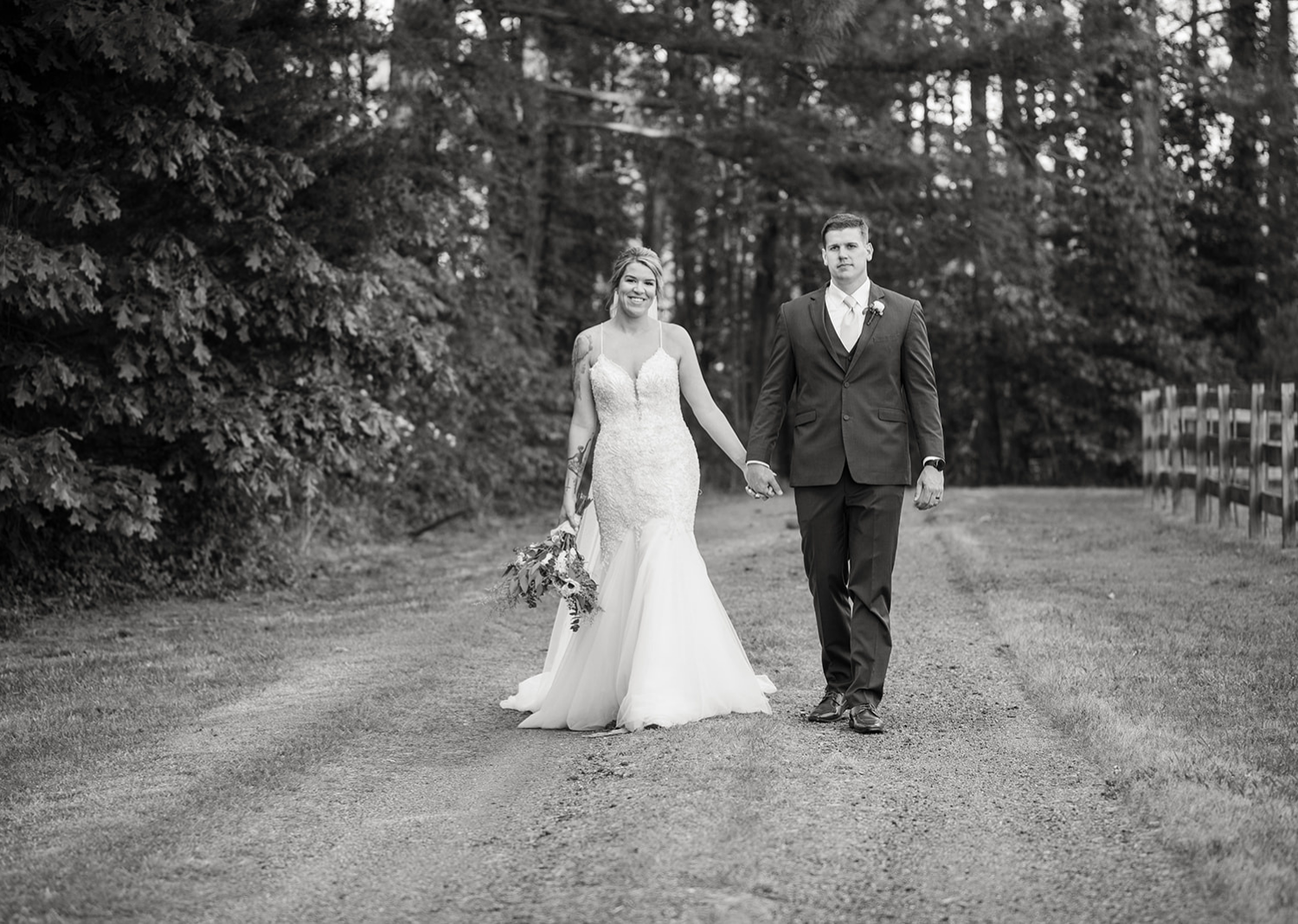 black and white photo of bride and groom outdoor portraits after wedding ceremony