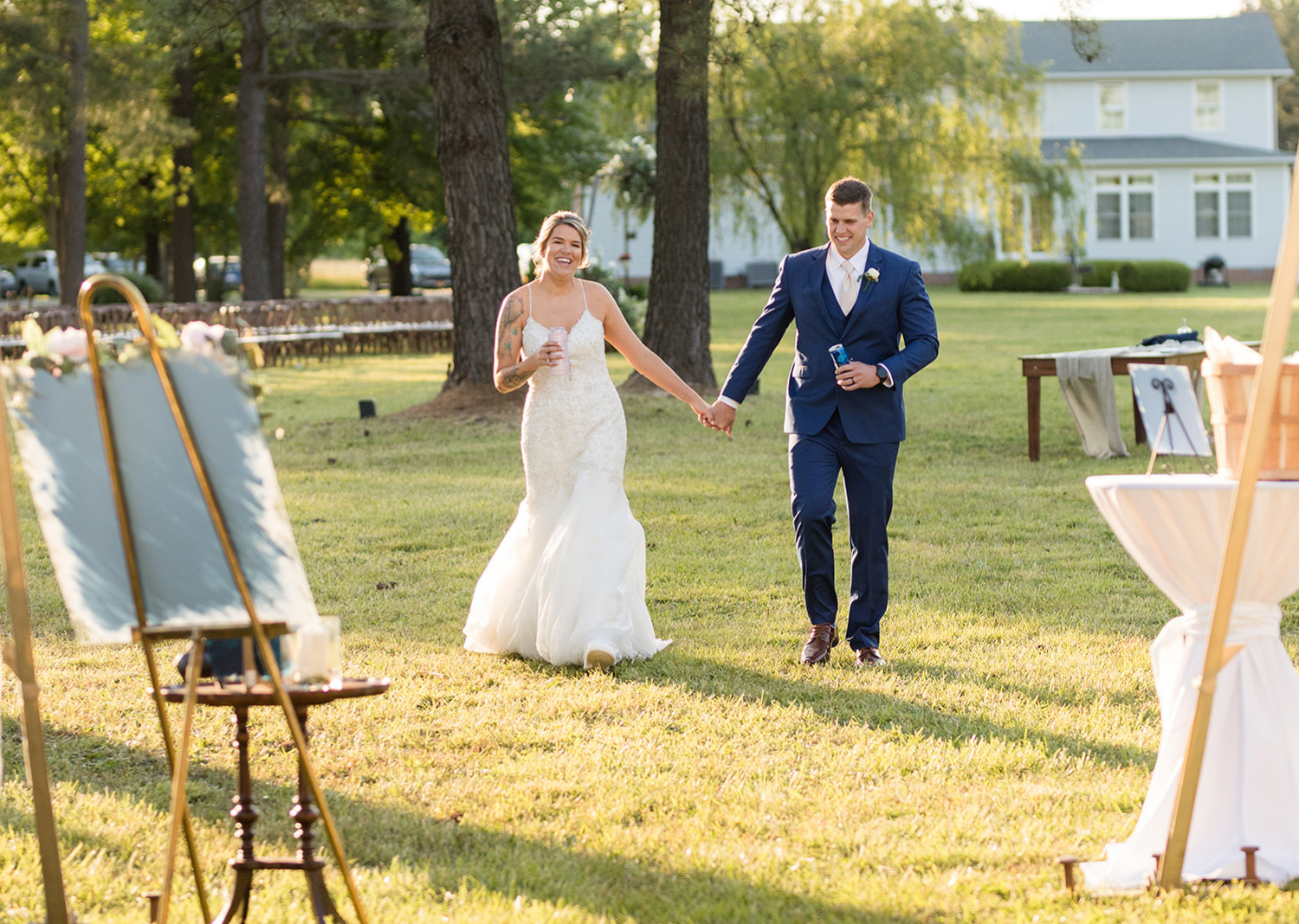 bride and groom approaching their venue for the wedding reception