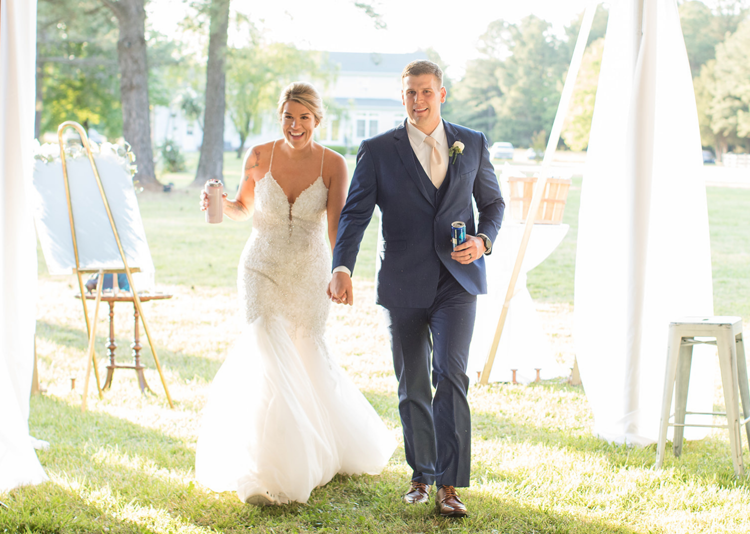 bride and groom entering the wedding reception