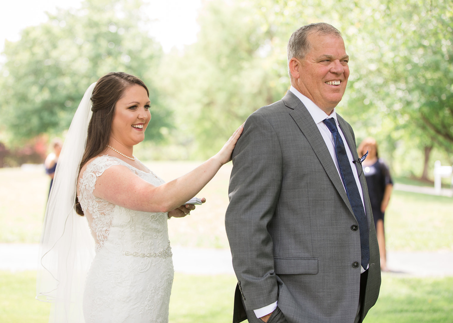 bride does first look with father of the bride