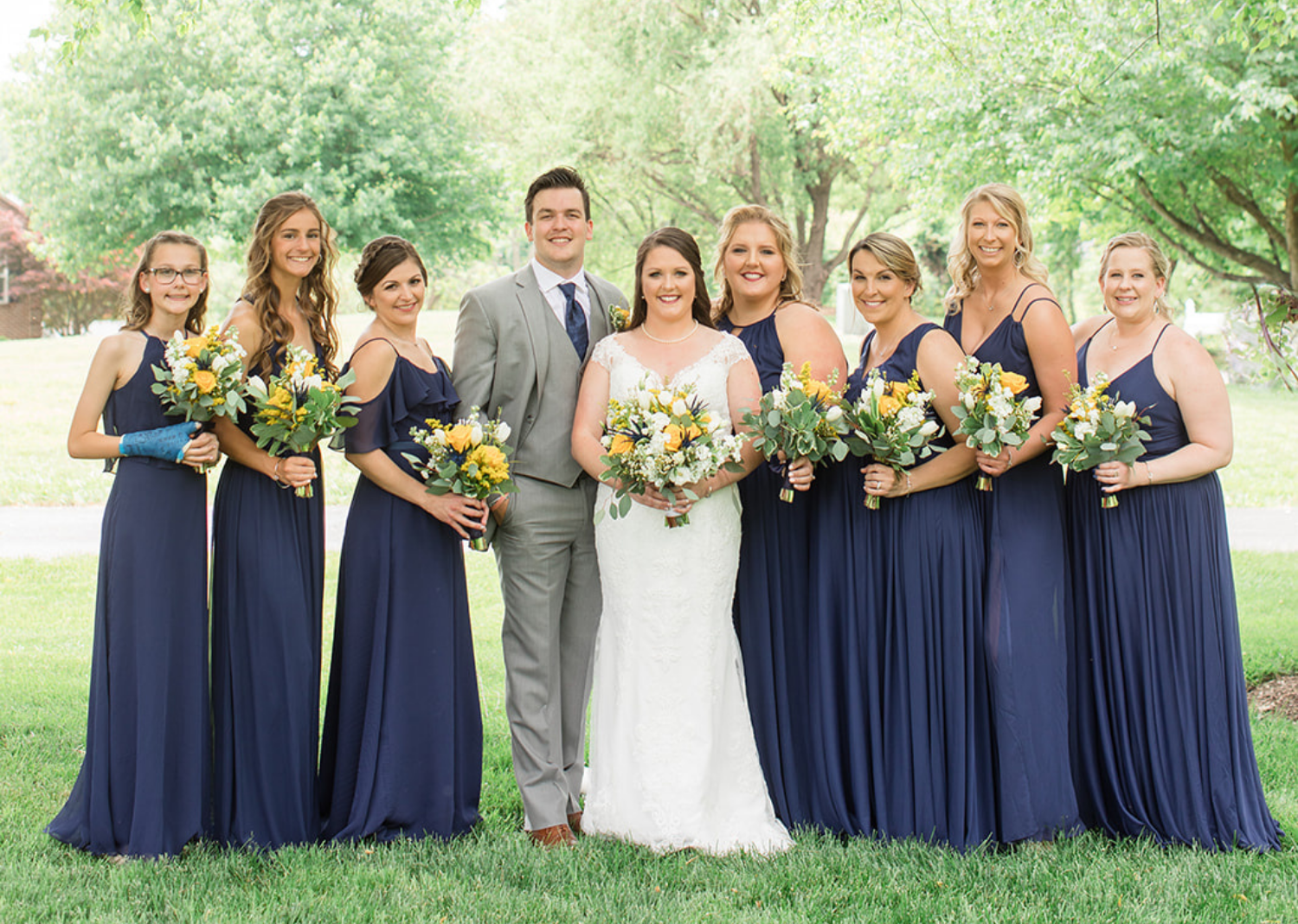 bride and groom with the wedding party