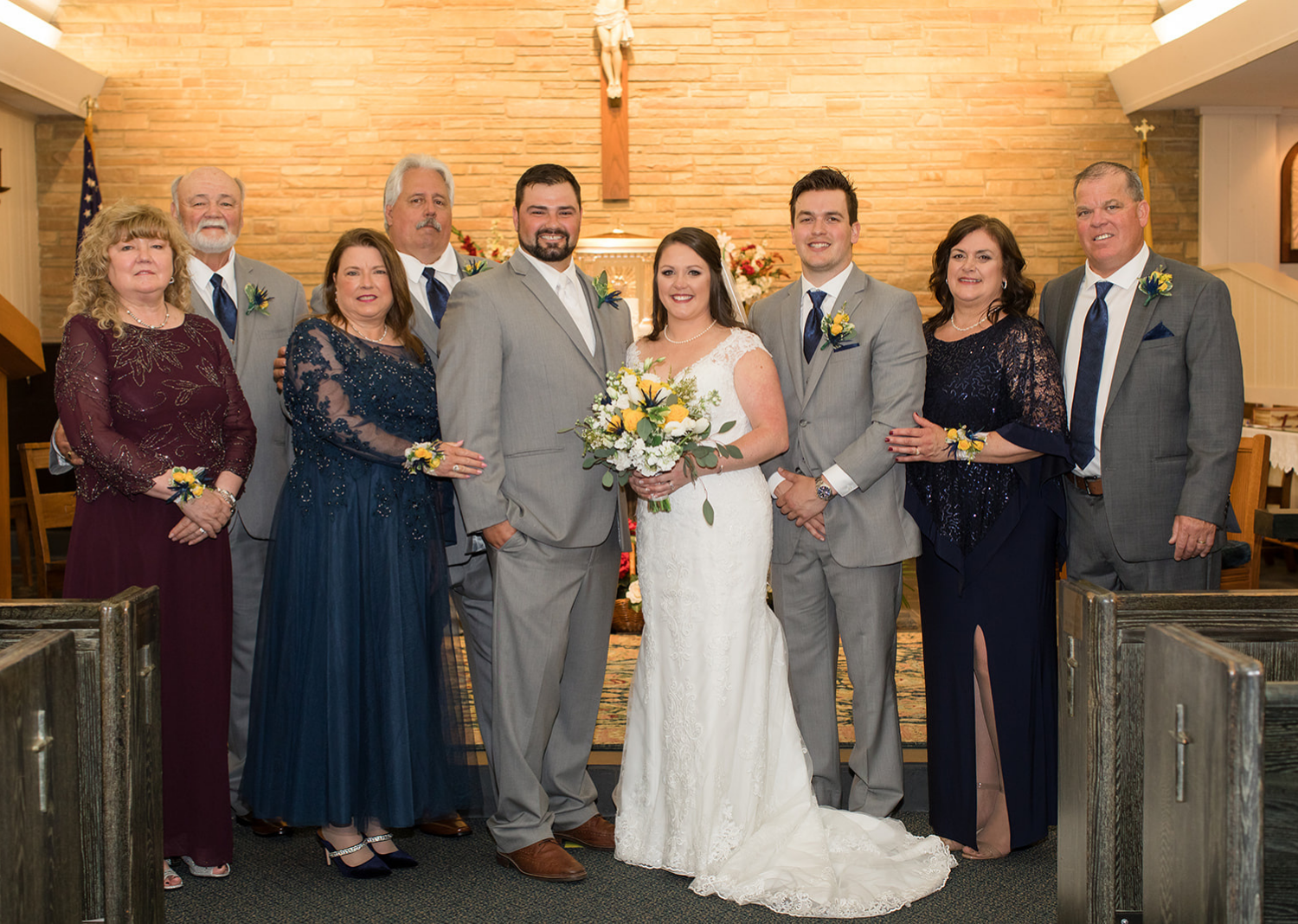 bride and groom with their family