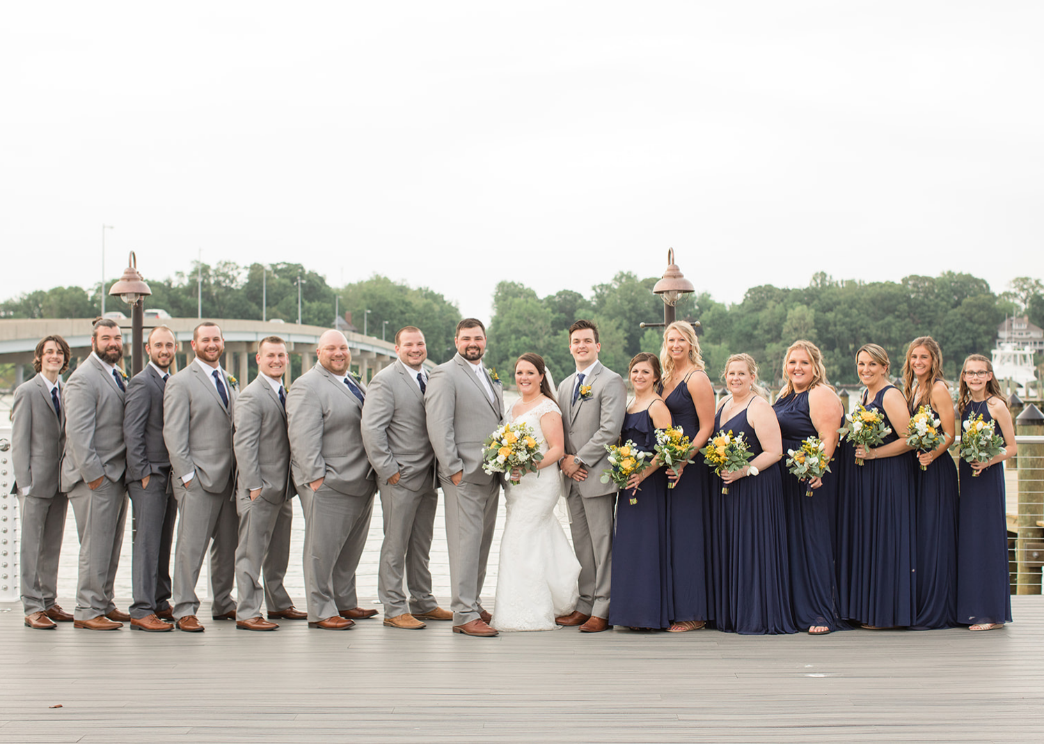 bride and groom with their wedding party