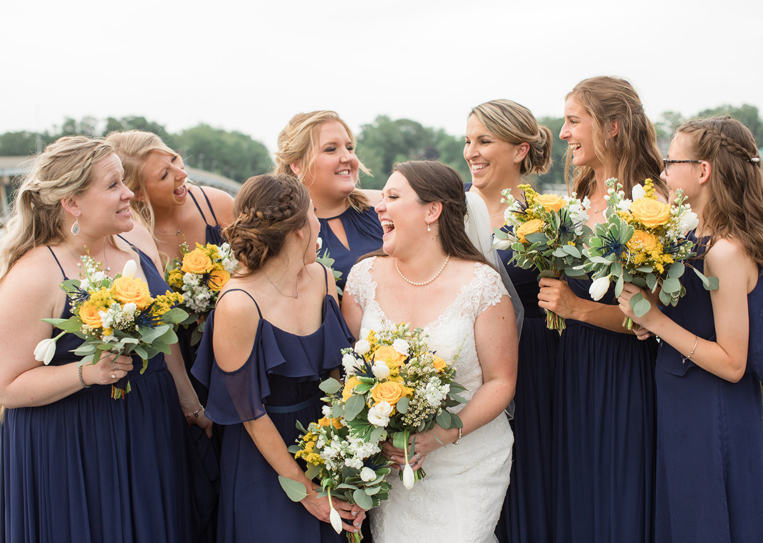 bride with her bridesmaids 