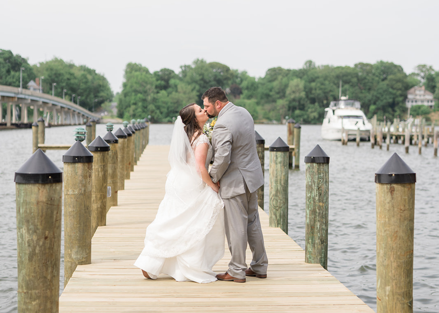 bride and groom outdoor portraits on the pier 