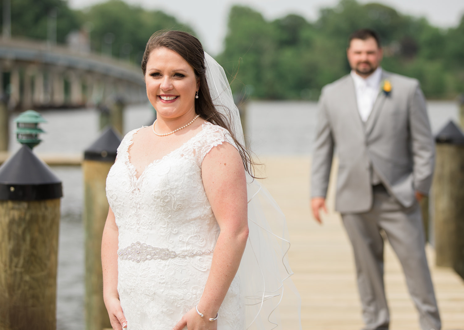 bride and groom outdoor portraits on the pier 