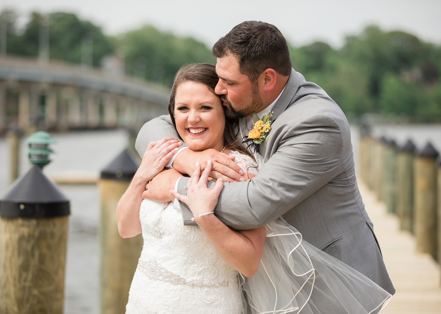 bride and groom outdoor portraits on the pier 