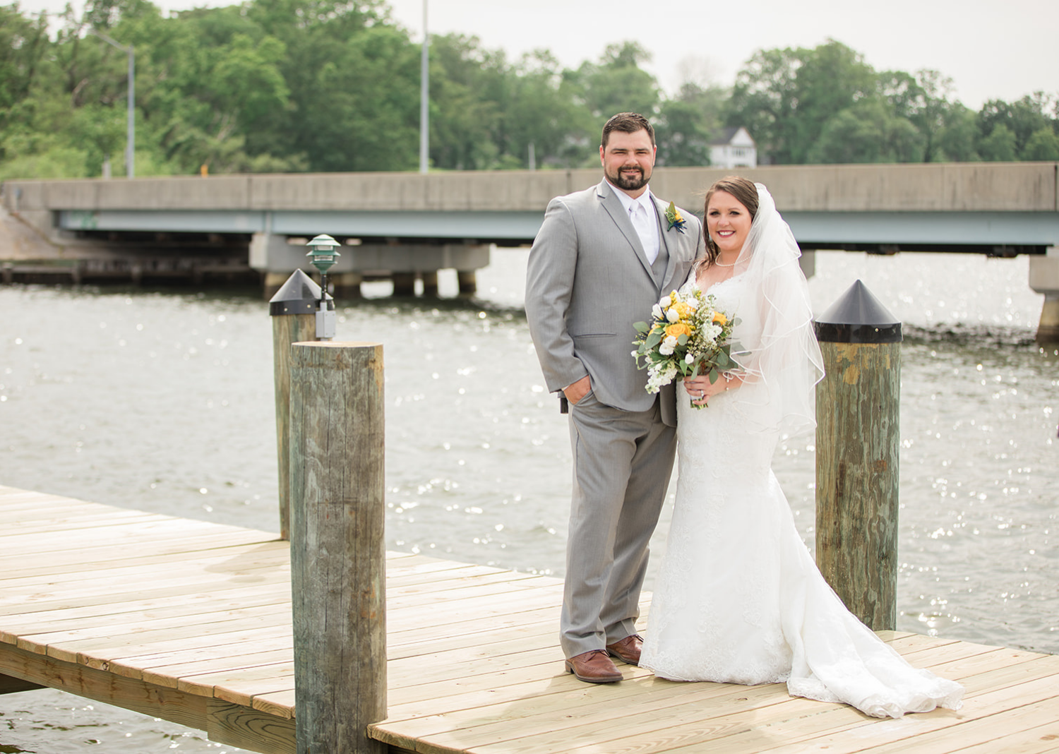 bride and groom outdoor portraits on the pier 