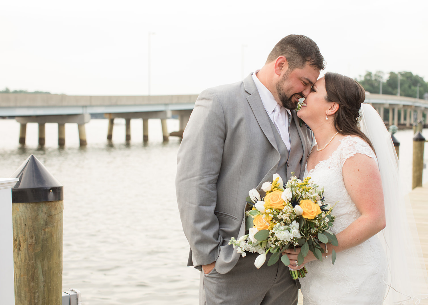 bride and groom outdoor portraits on the pier 