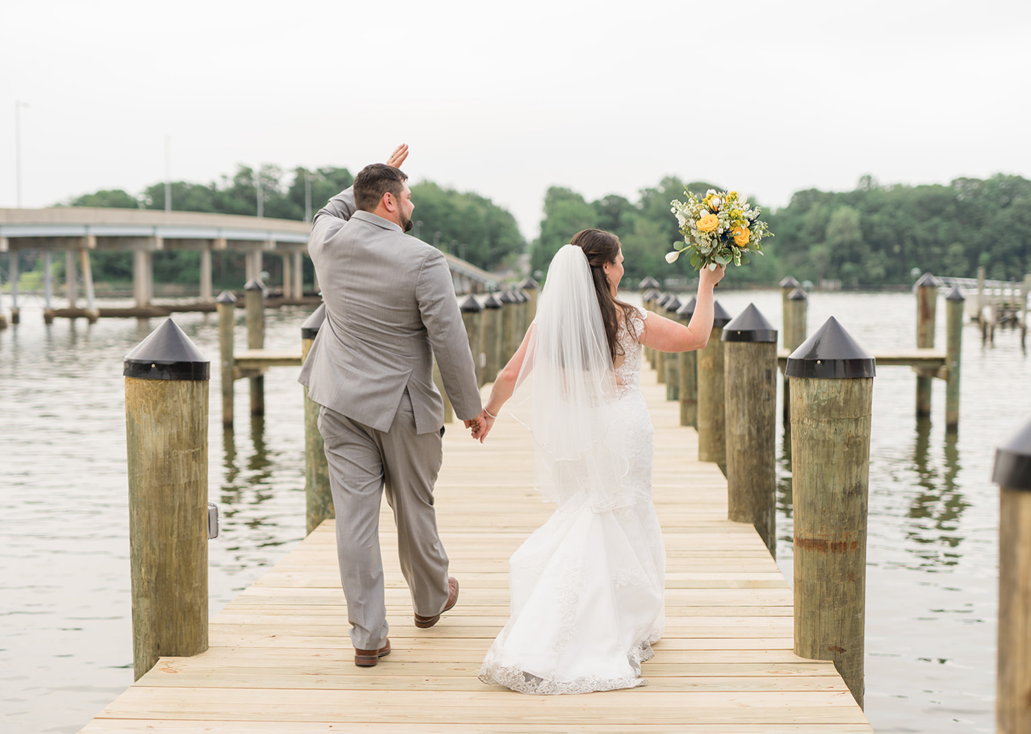 bride and groom outdoor portraits on the pier 