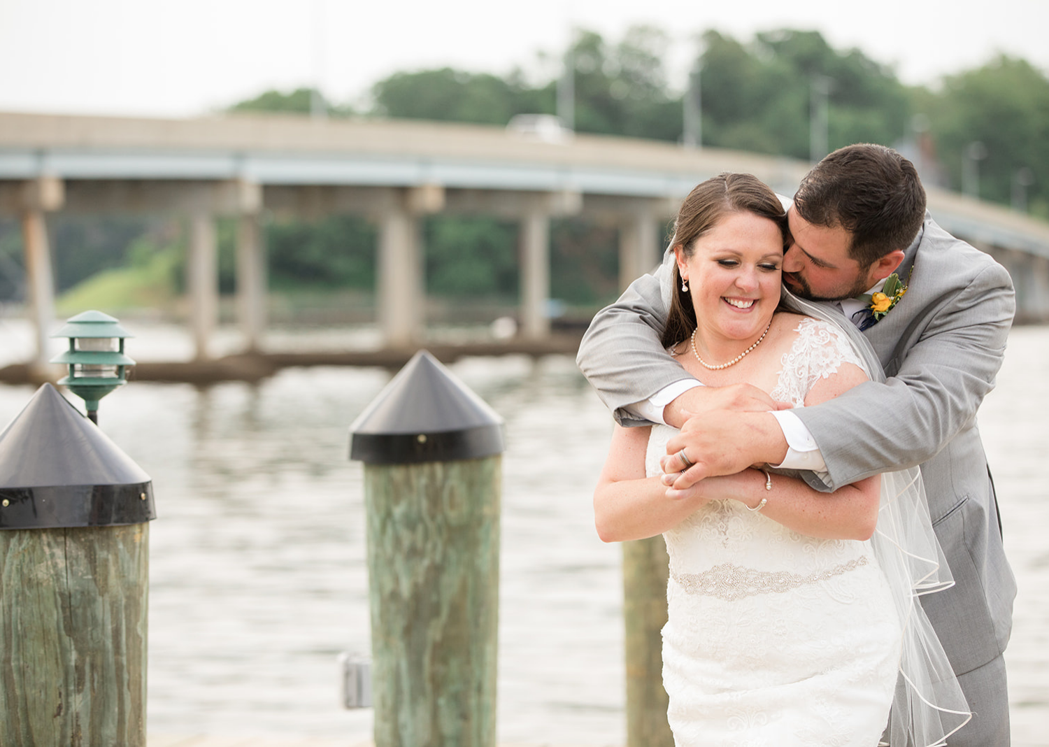 bride and groom outdoor portraits on the pier 