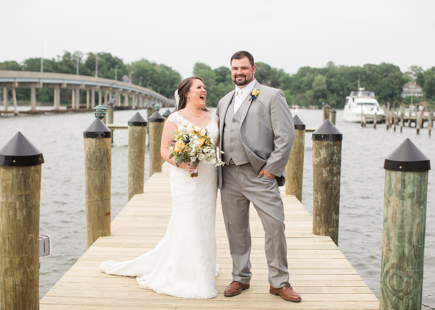 bride and groom outdoor portraits on the pier