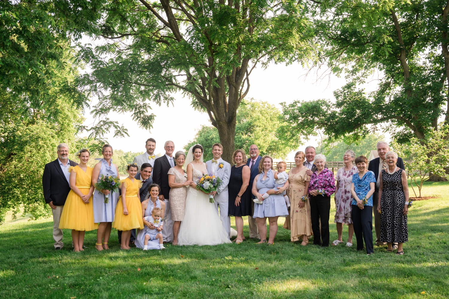 bride and groom with family