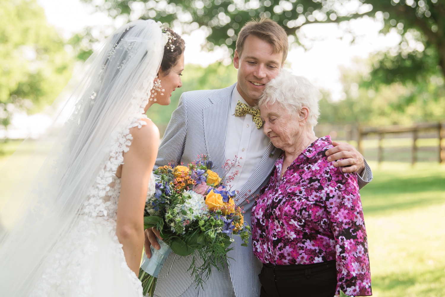 groom hugging his grandmother