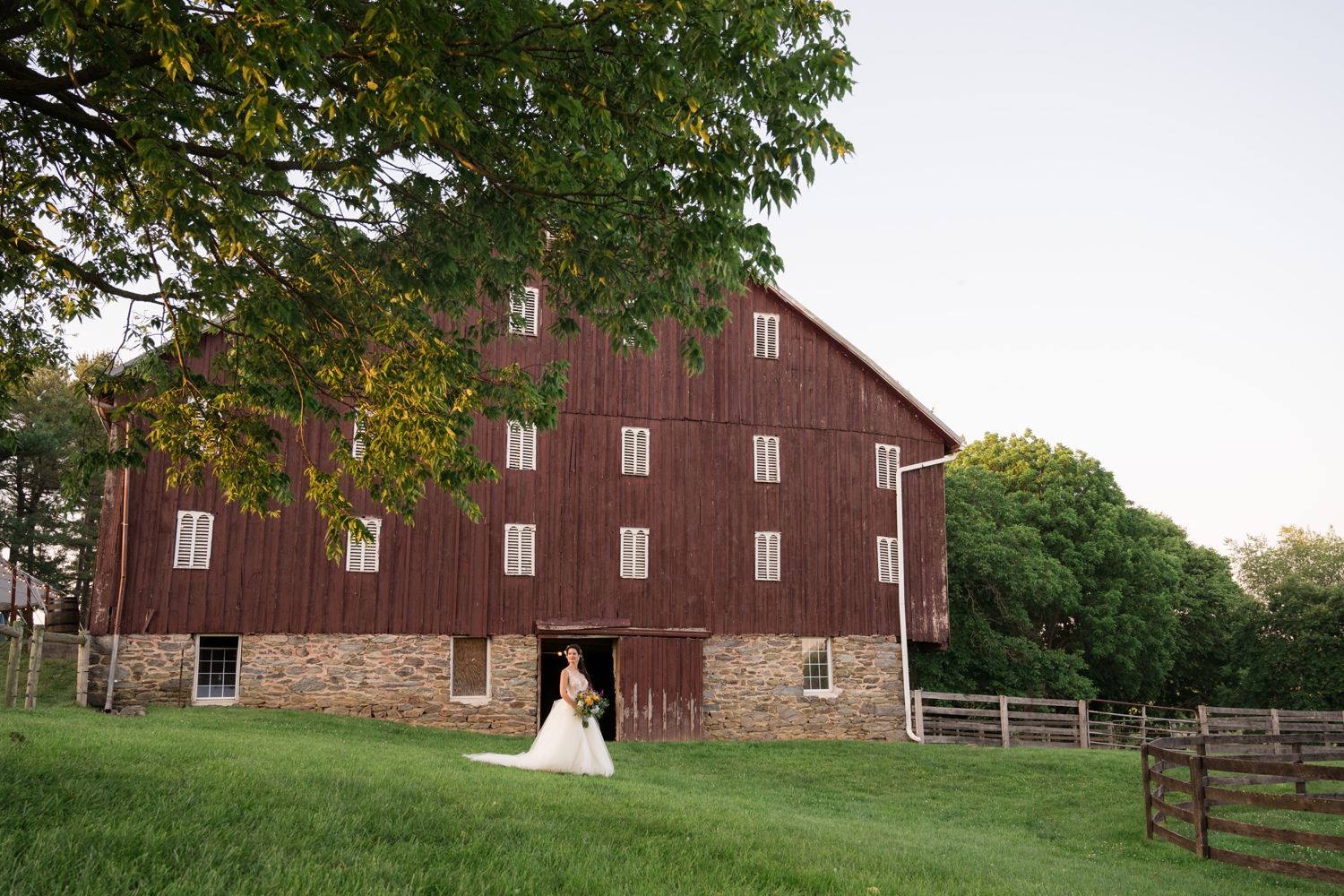 stunning bride by the barn