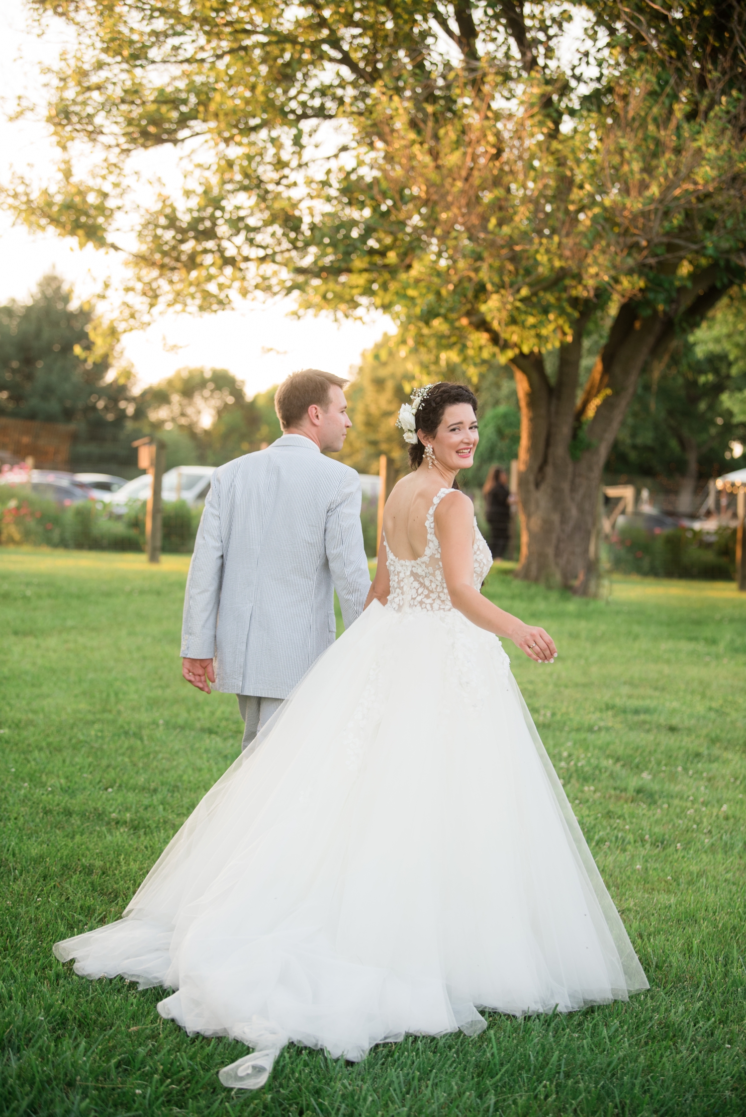 bride looks back coyly during portraits