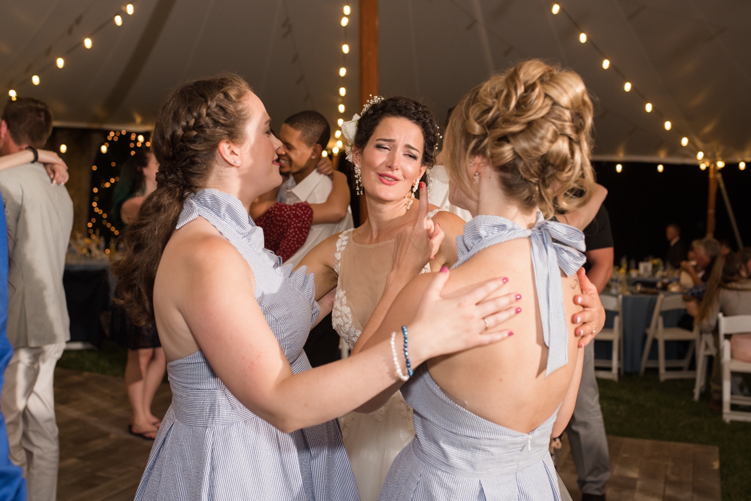 bride dancing with bridesmaids