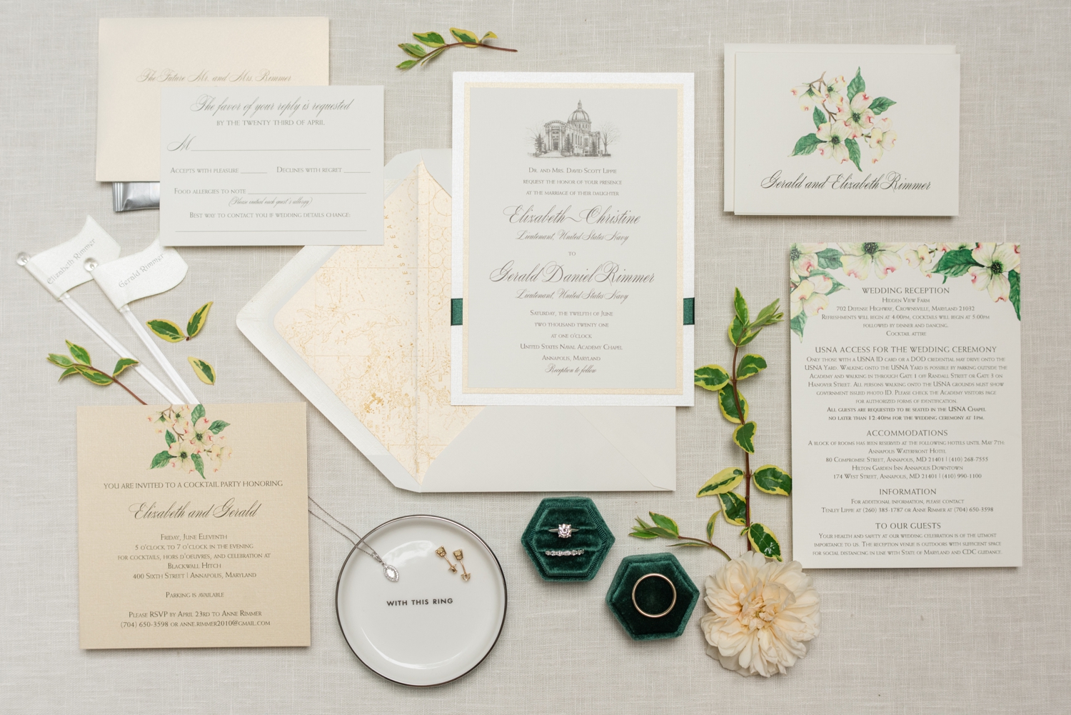 wedding invitation and bridal details are displayed beautifully on a cream background