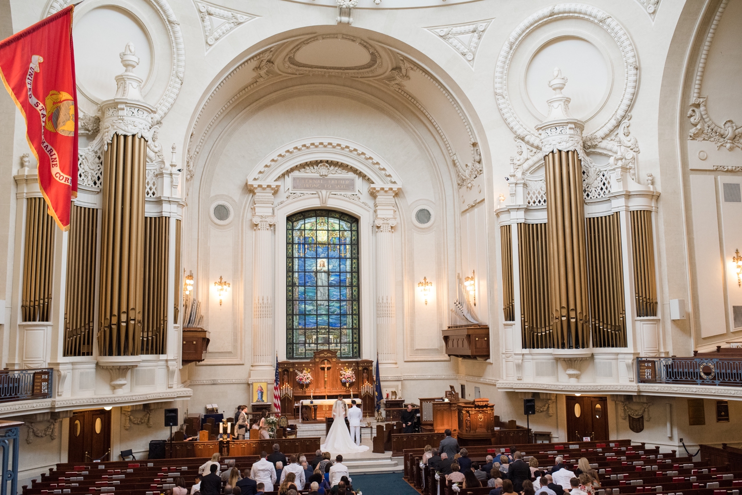 Wide shot from the choir balcony of the ceremony.