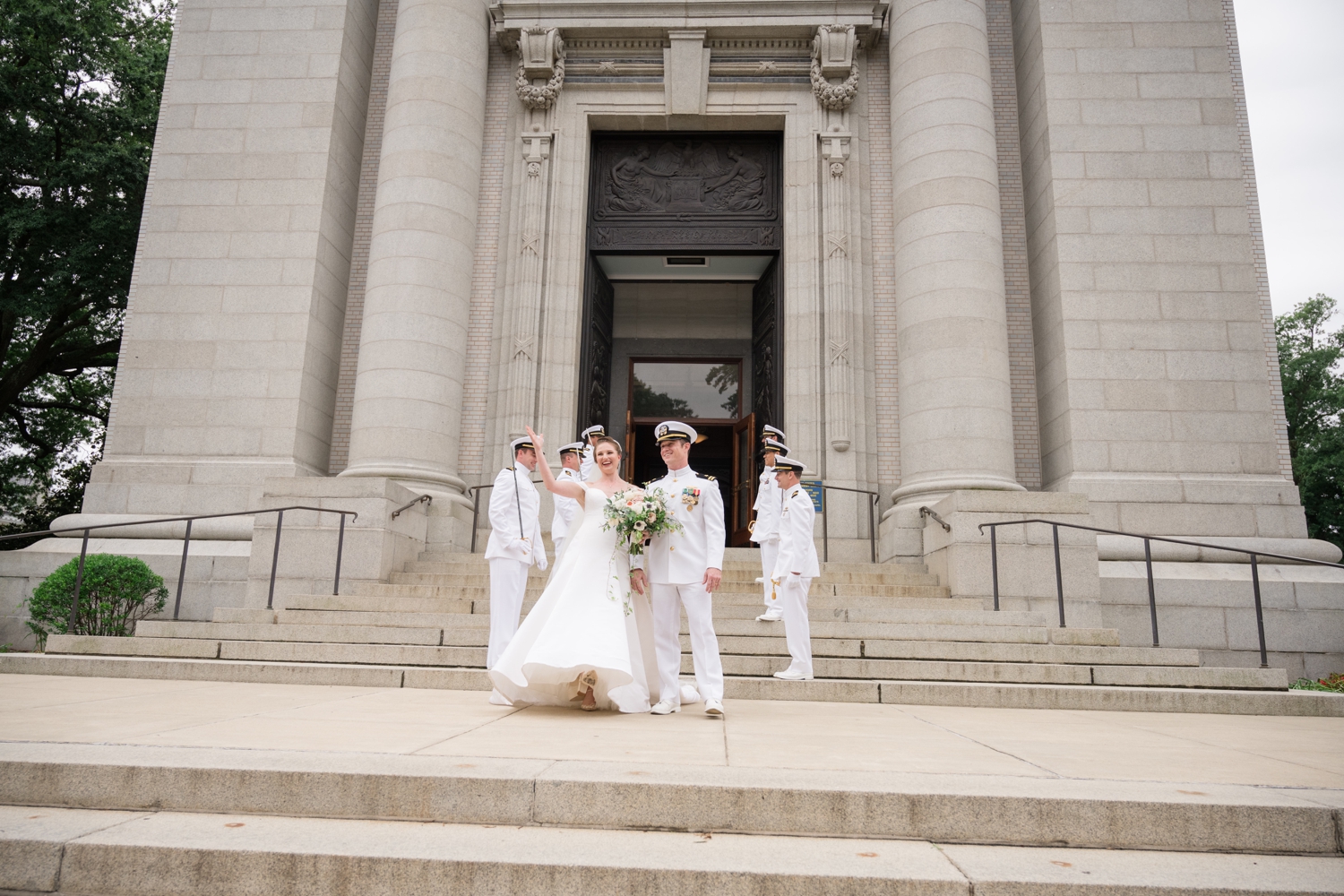 Bride and groom leaving the church in a celebratory fashion