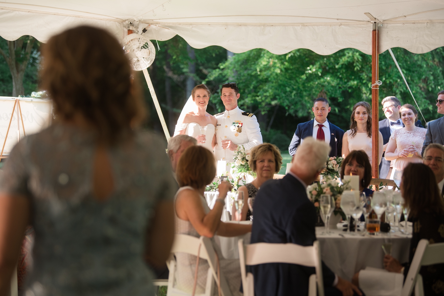 bride and groom enjoying toasts