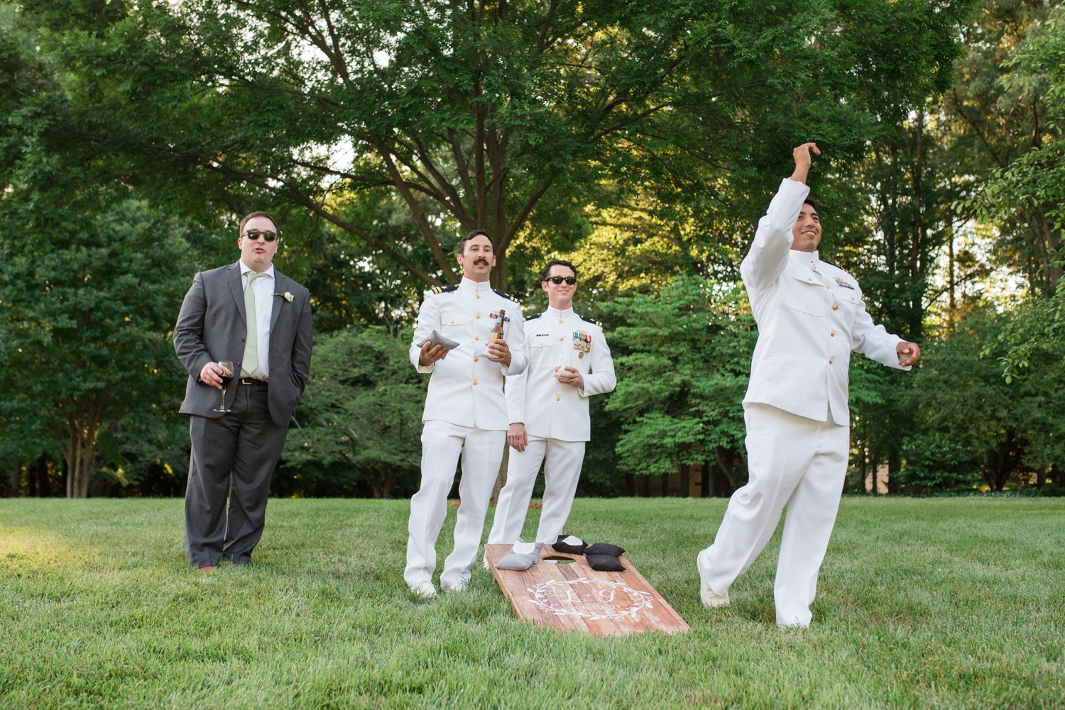 guests playing cornhole