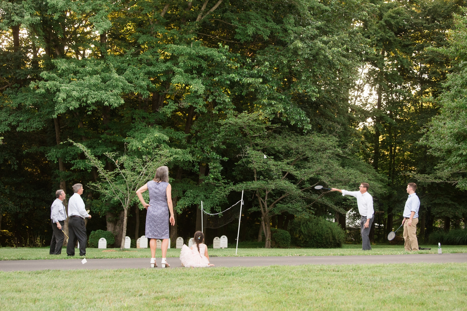 guests enjoying cornhole