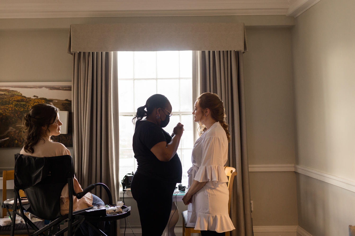 bride and the makeup artists