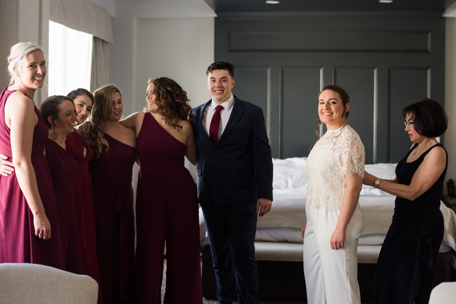 bridal party poses together