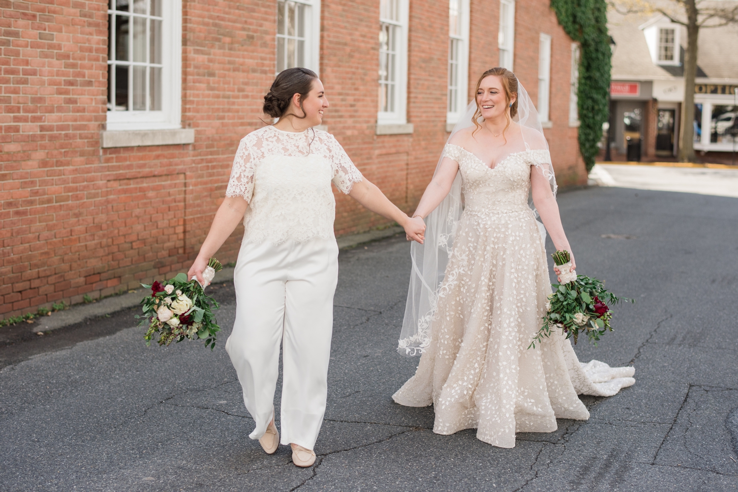 couple laughs and walks together