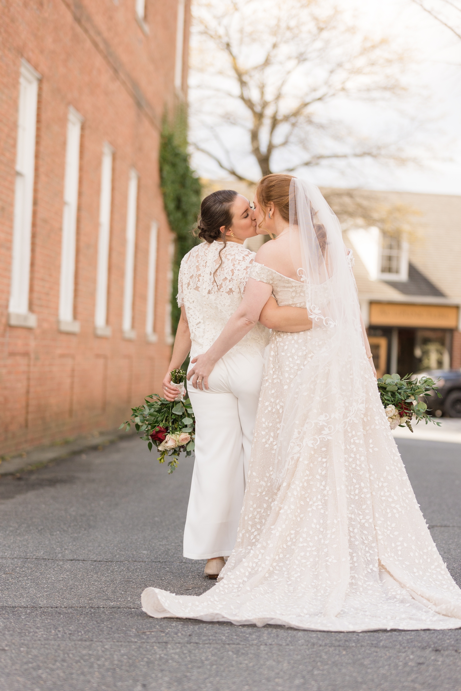 brides kiss and sneak a tush grab