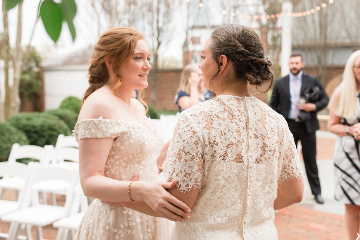 couple stands together at the Tidewater Inn