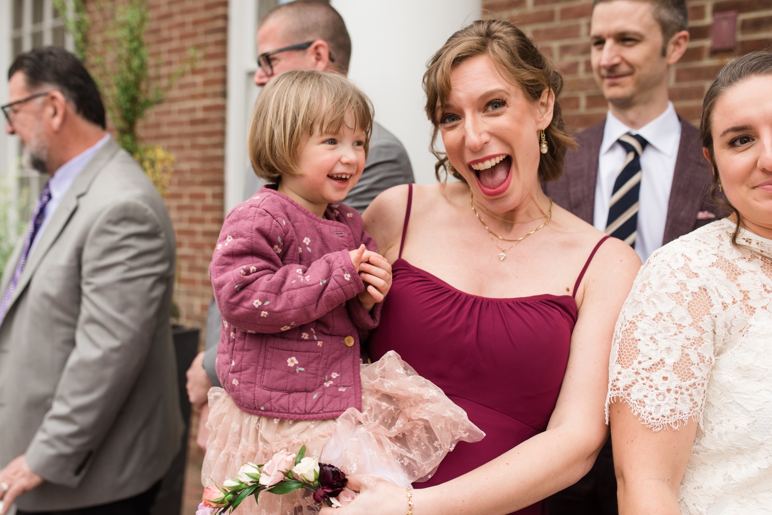 wedding guests enjoy cocktail hour at the Tidewater Inn