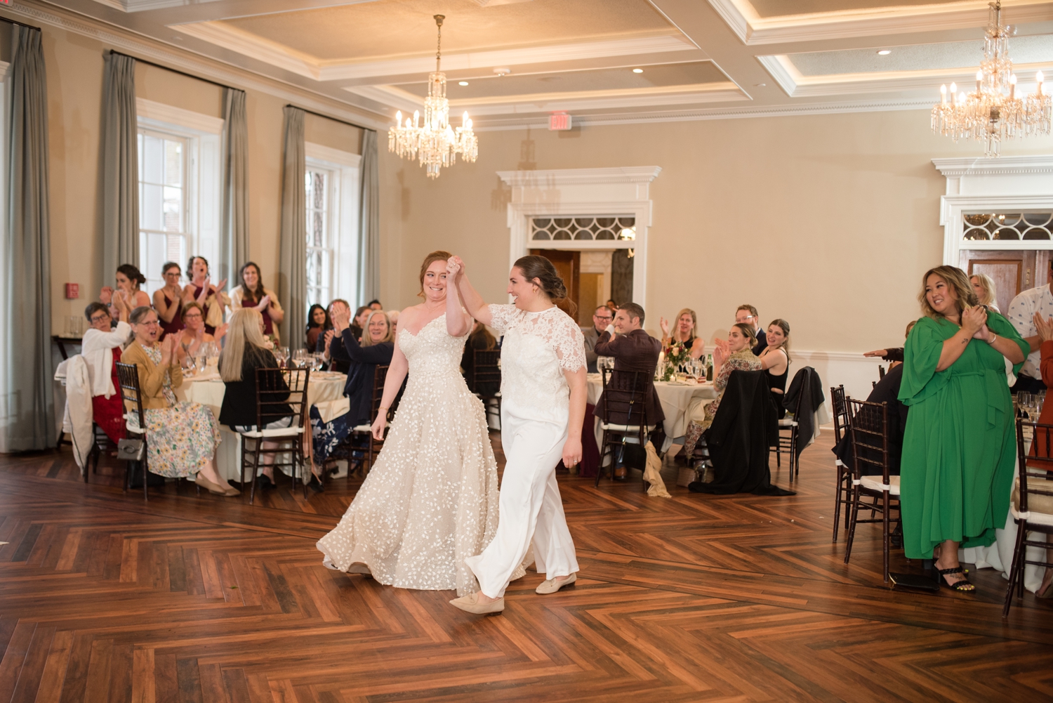 couple enters their reception at the Tidewater Inn