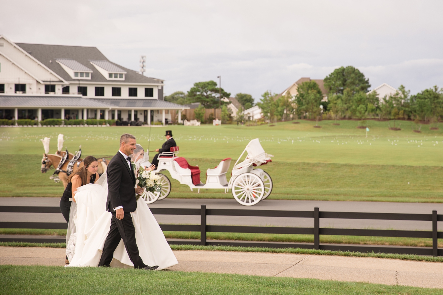 bride and her father enter into ceremony space