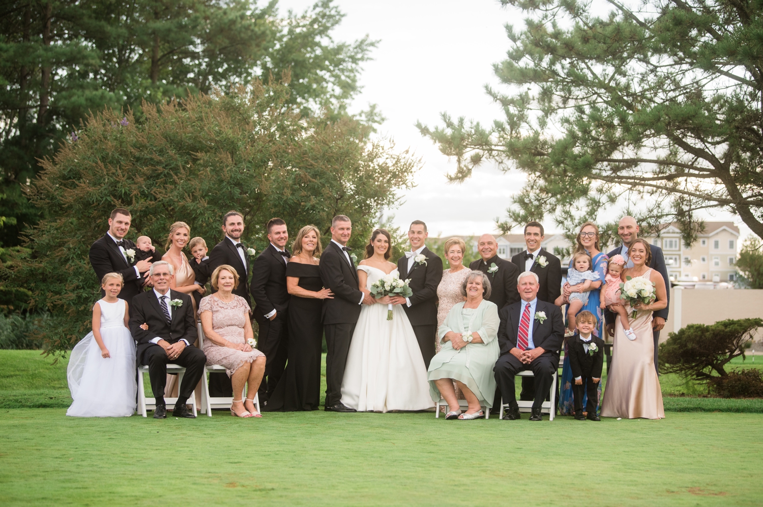 bride and groom with family