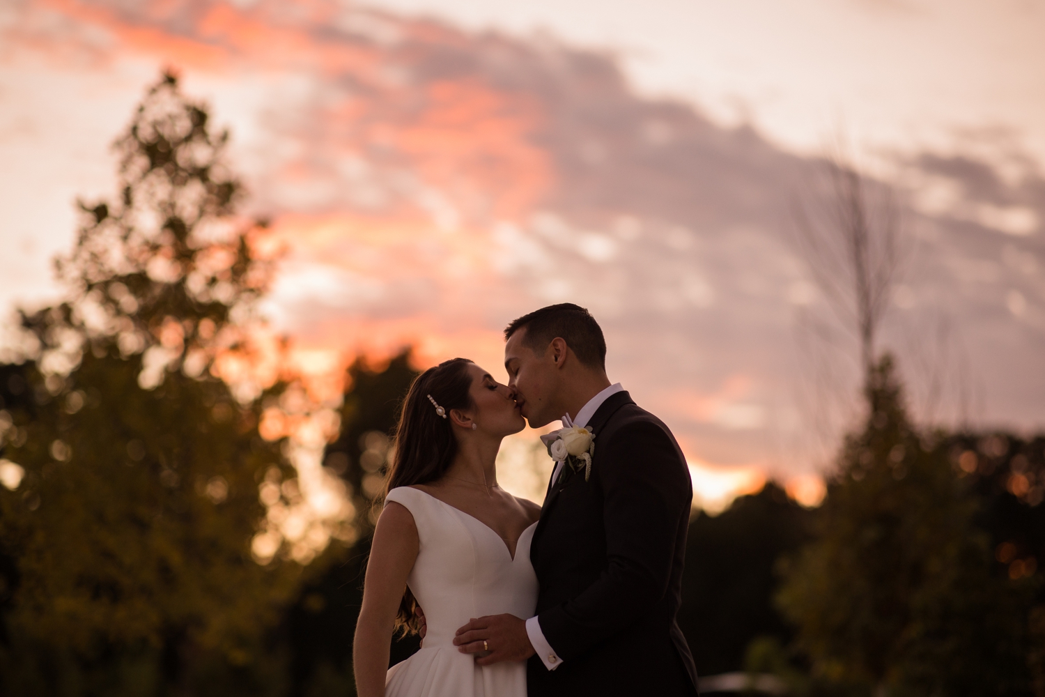 bride and groom kissing