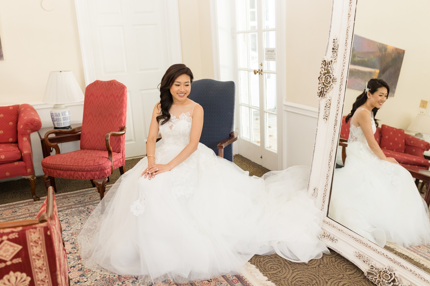 bride sits in bridal suite at Hyatt Regency Bethesda