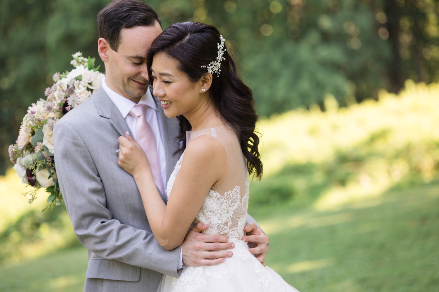 bride and groom share first look on the grounds at Woodend Sanctuary & Mansion 