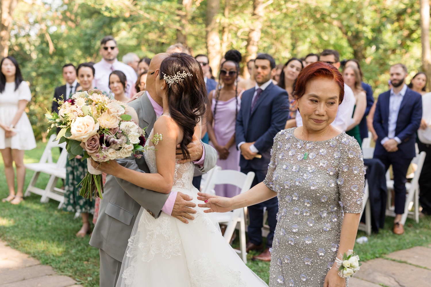 parents give bride away at ceremony at Woodend Sanctuary & Mansion 