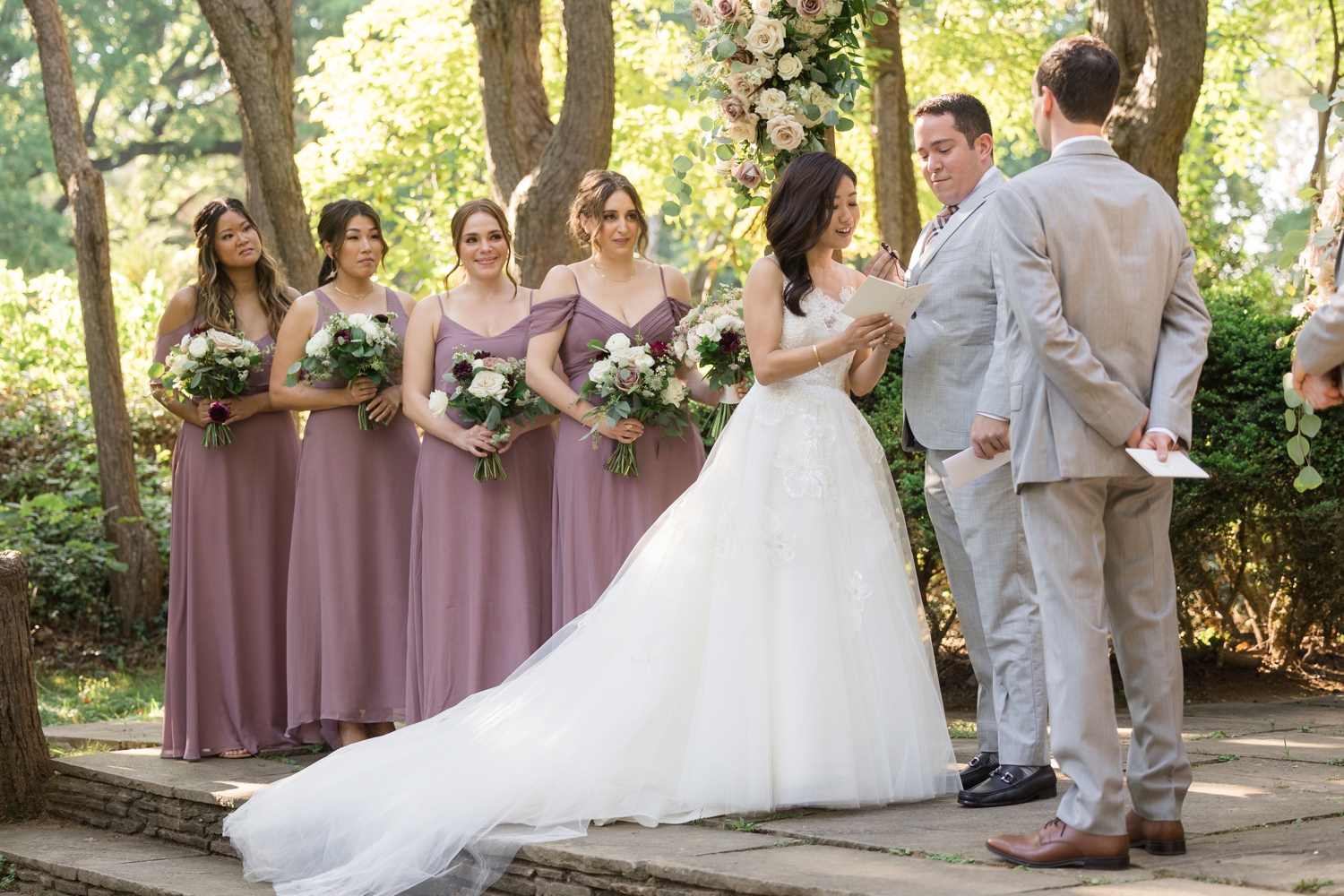 bride shares vows with groom during ceremony at Woodend Sanctuary & Mansion 