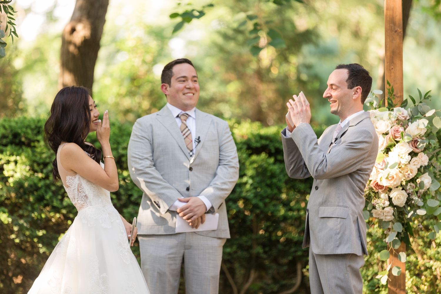 groom shares vows with bride during ceremony at Woodend Sanctuary & Mansion 