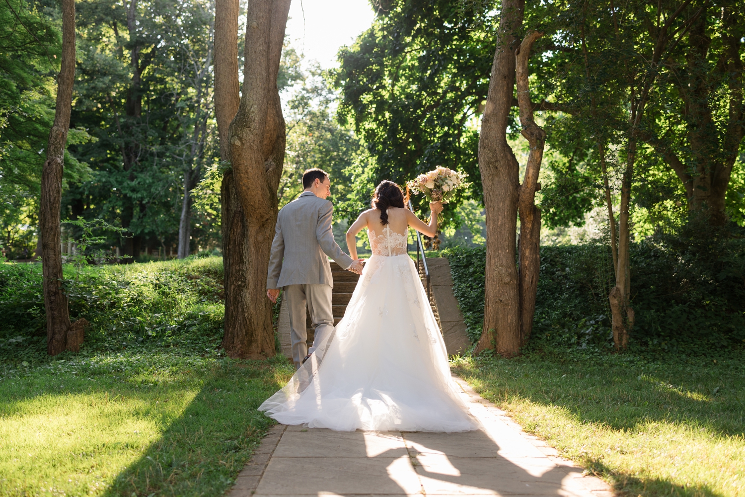 bride and groom exit their ceremony at Woodend Sanctuary & Mansion 