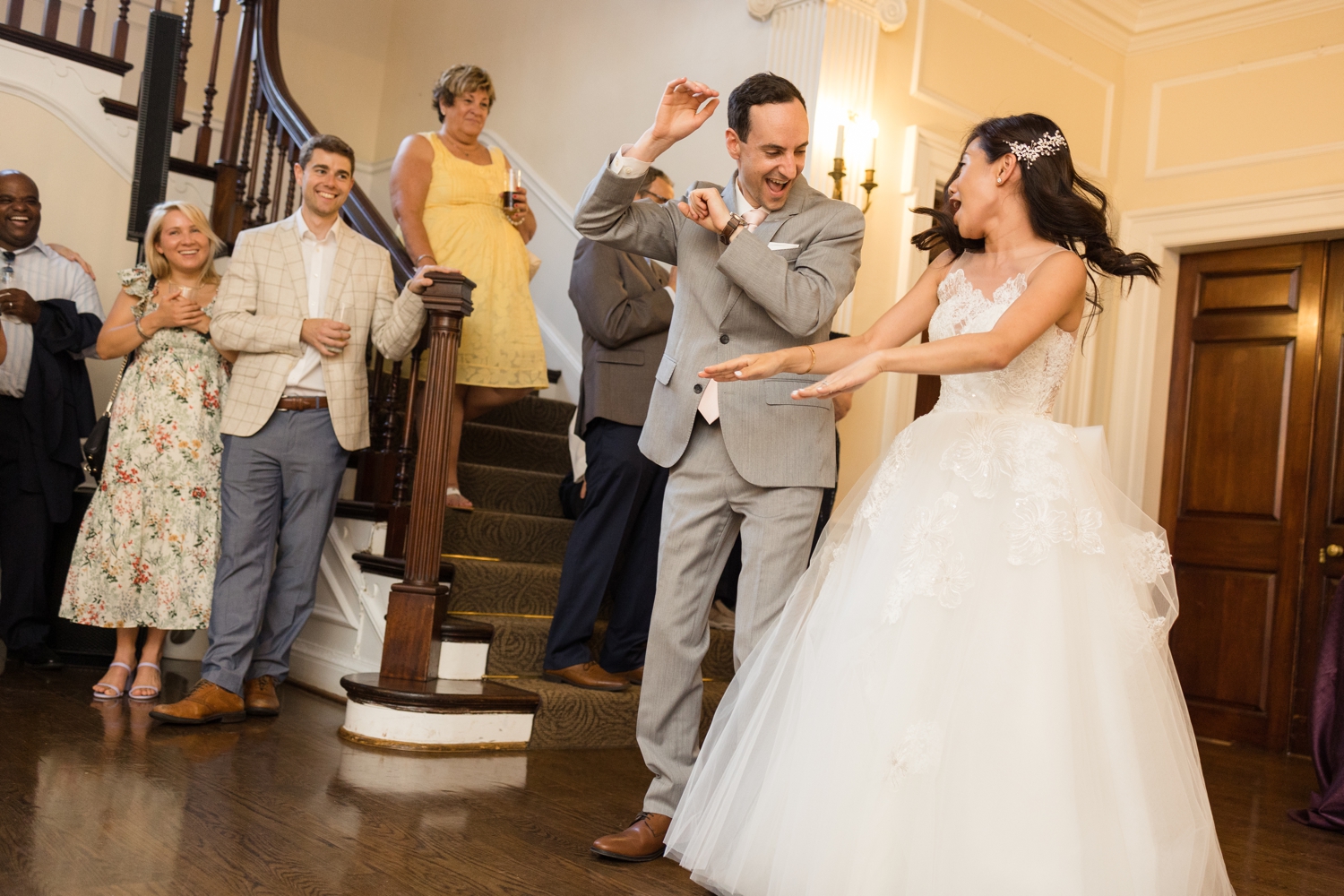 bride and groom dance together during reception at Woodend Sanctuary & Mansion 