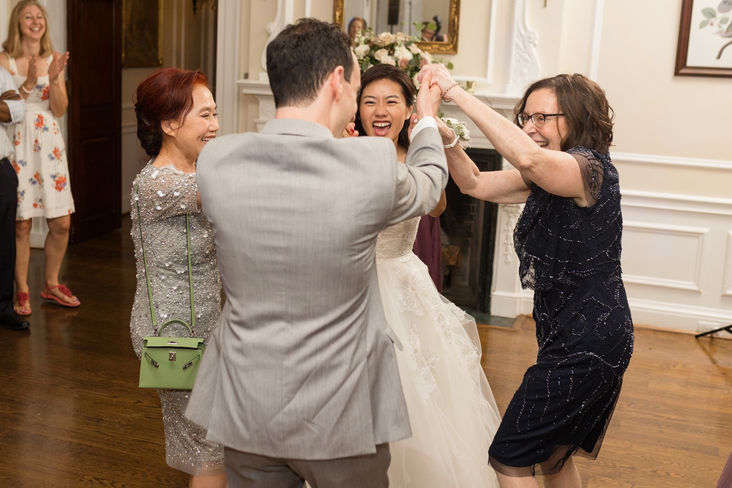 mothers and bride and groom dance at Woodend Sanctuary & Mansion 