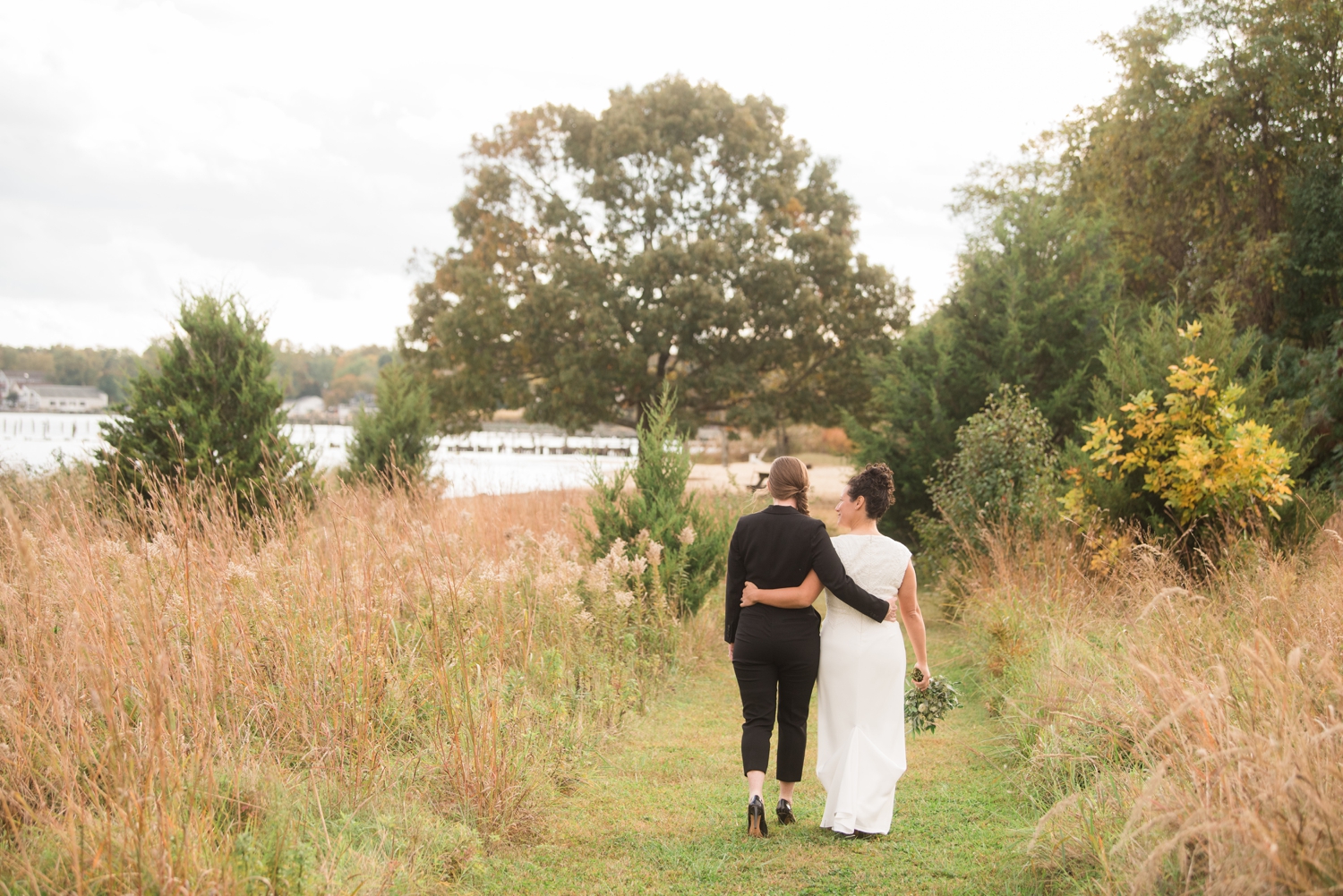 Chesapeake Bay Foundation lesbian wedding photographer beach wedding couple photos