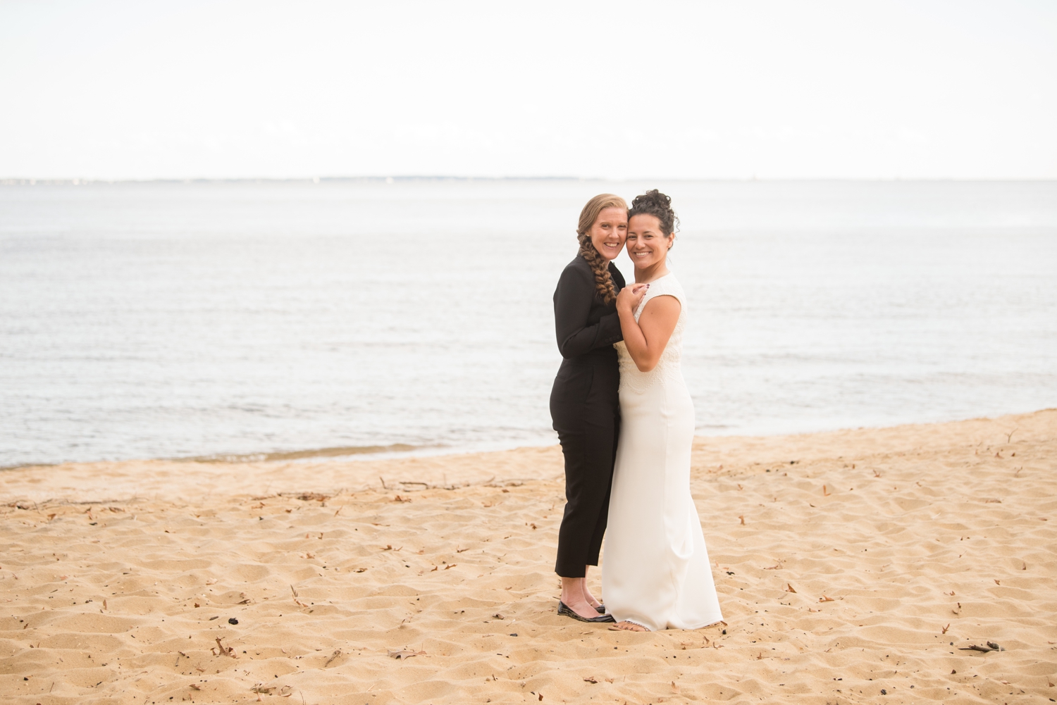 Chesapeake Bay Foundation lesbian wedding photographer beach wedding couple photos