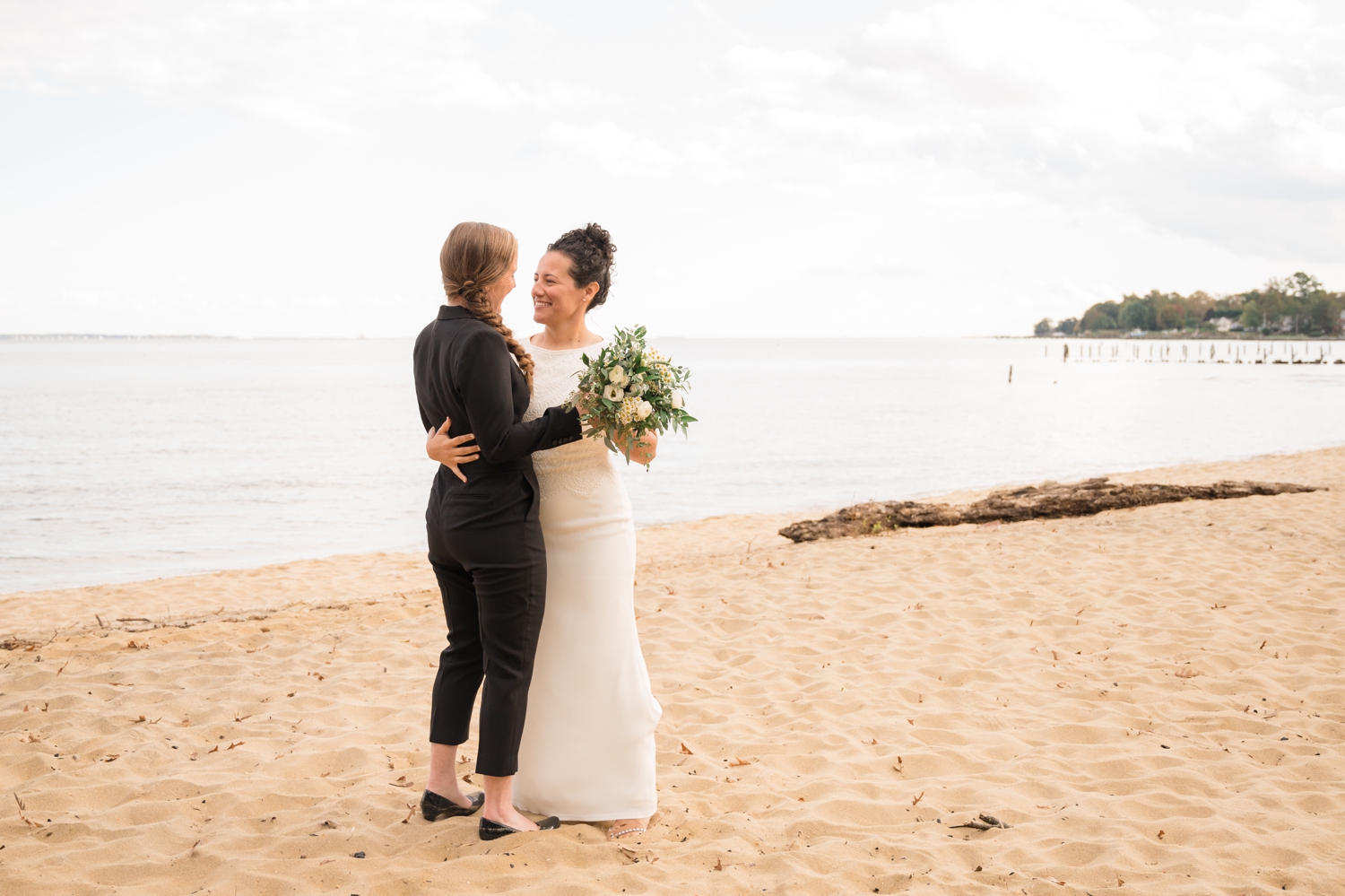 Chesapeake Bay Foundation lesbian wedding photographer beach wedding couple photos