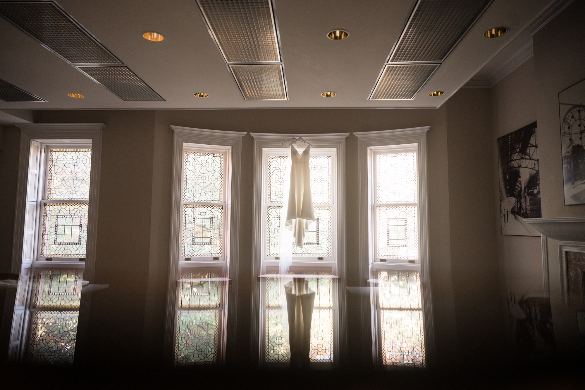 Engineers Club Mt Vernon wedding dress hanging in the windows