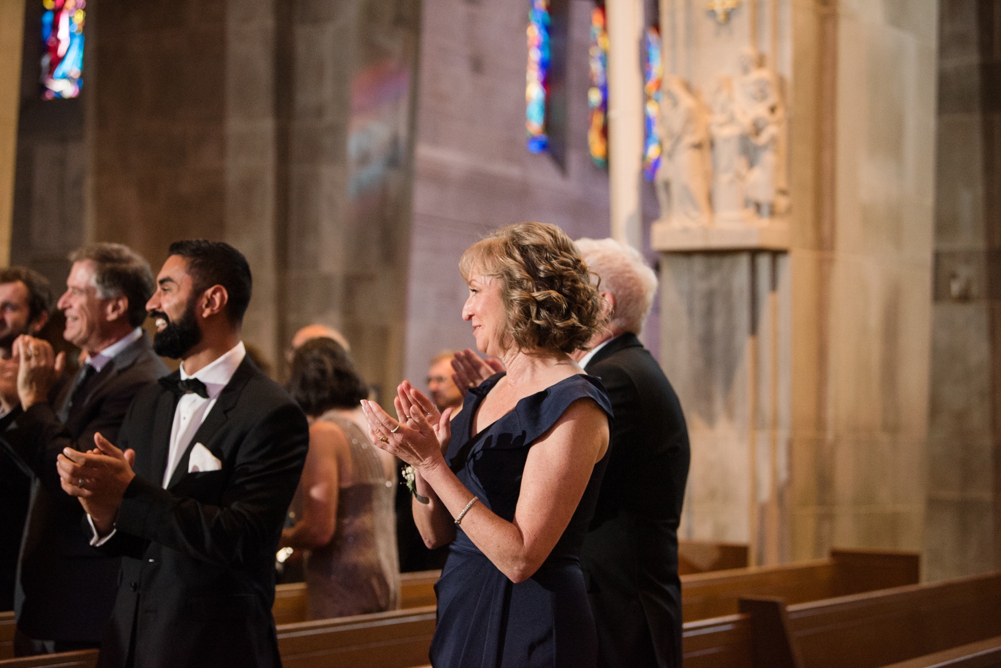 Cathedral of Mary our Queen wedding ceremony couple dipping in the aisle